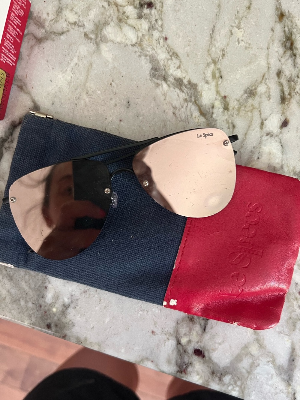 Le Specs aviator sunglasses with gold lenses case